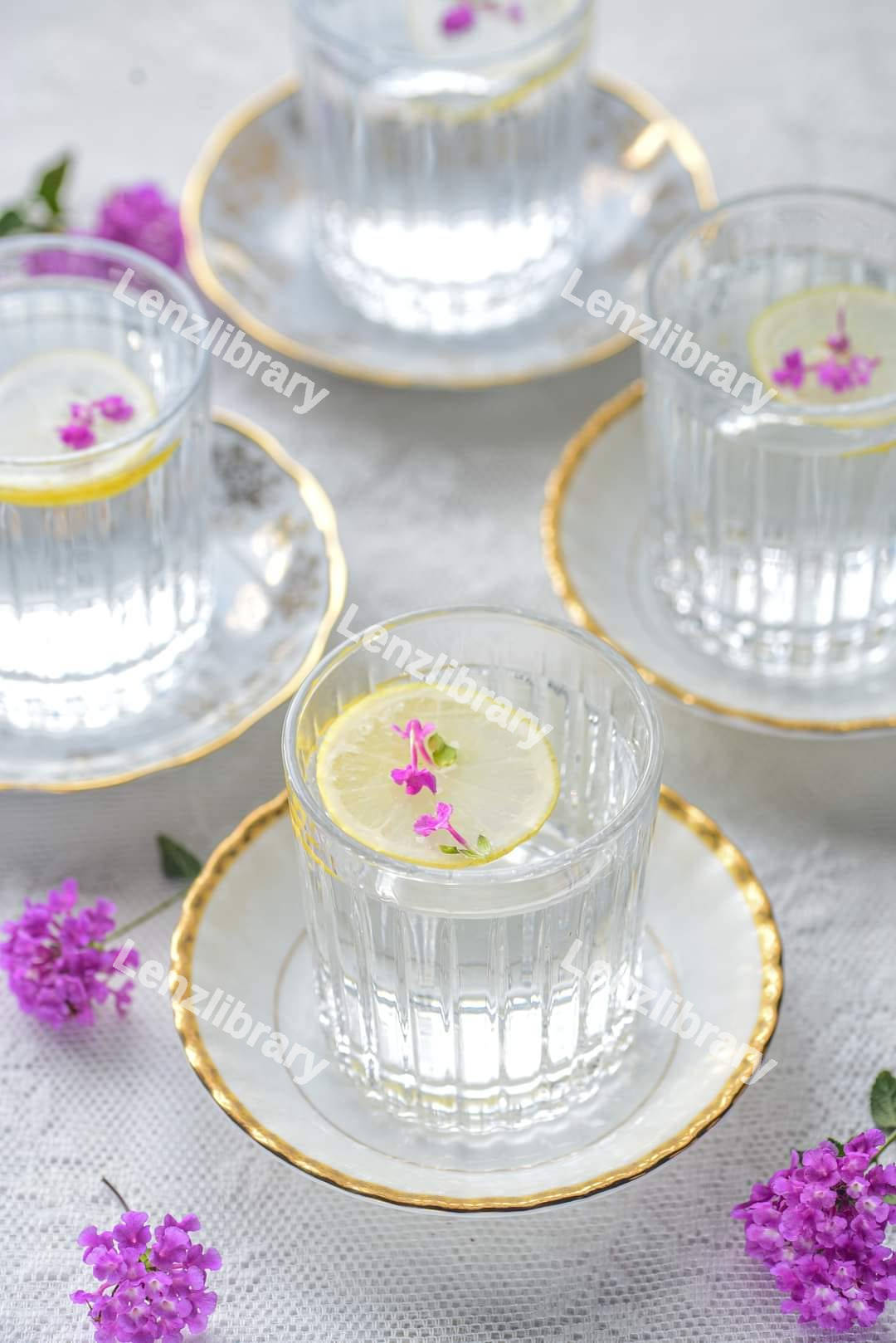 Glasses with water and a slice of lemon